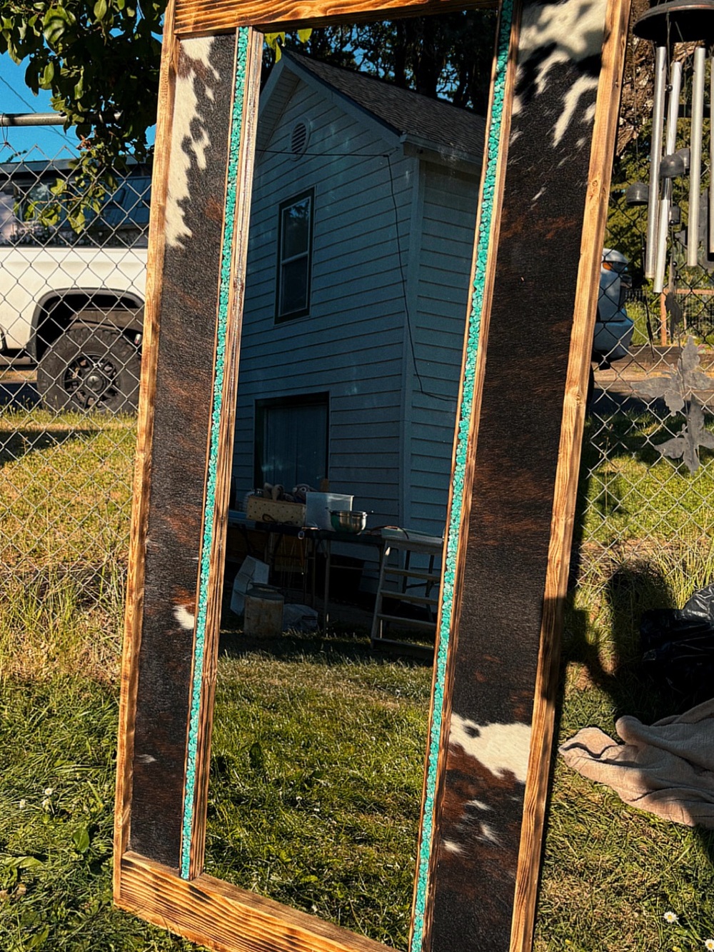 Rustic Brown Cowhide Wall Mirror with Turquoise Accents